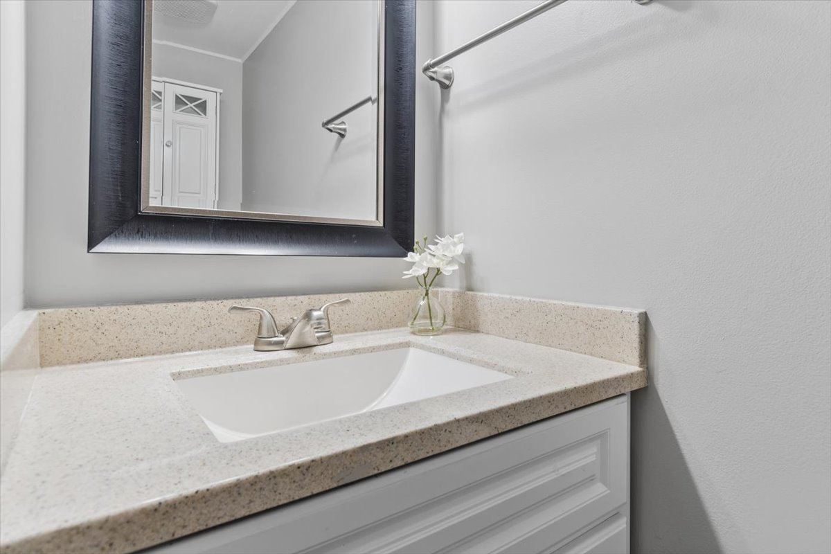 3131 Portland Court Aurora, IL 60504 - Photo 12 of 20 a bathroom with a sink and a mirror