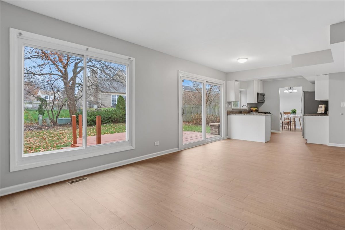 3131 Portland Court Aurora, IL 60504 - Photo 10 of 20 a view of a kitchen with furniture and a large window