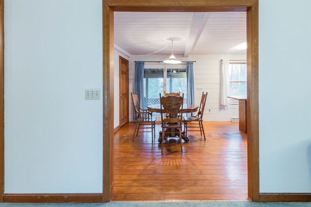 4 Coombs Road Rochester, MA 02770 - Photo 4 of 27 a view of a dining room with furniture and wooden floor