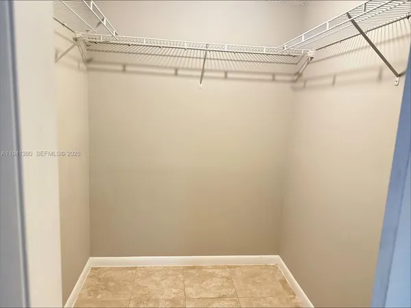 a view of a room with racks on the wall