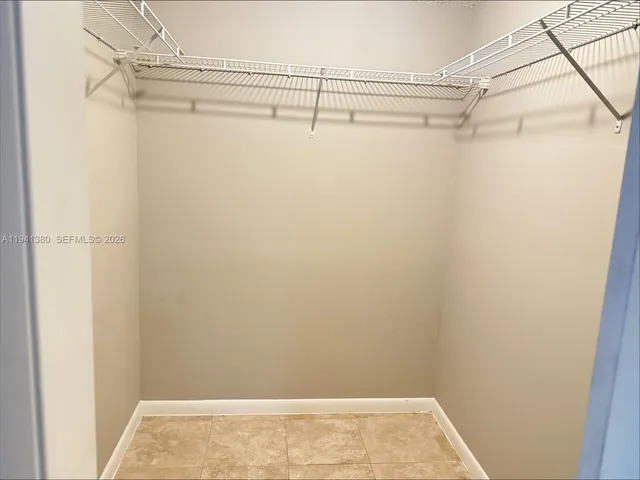 a view of a room with racks on the wall