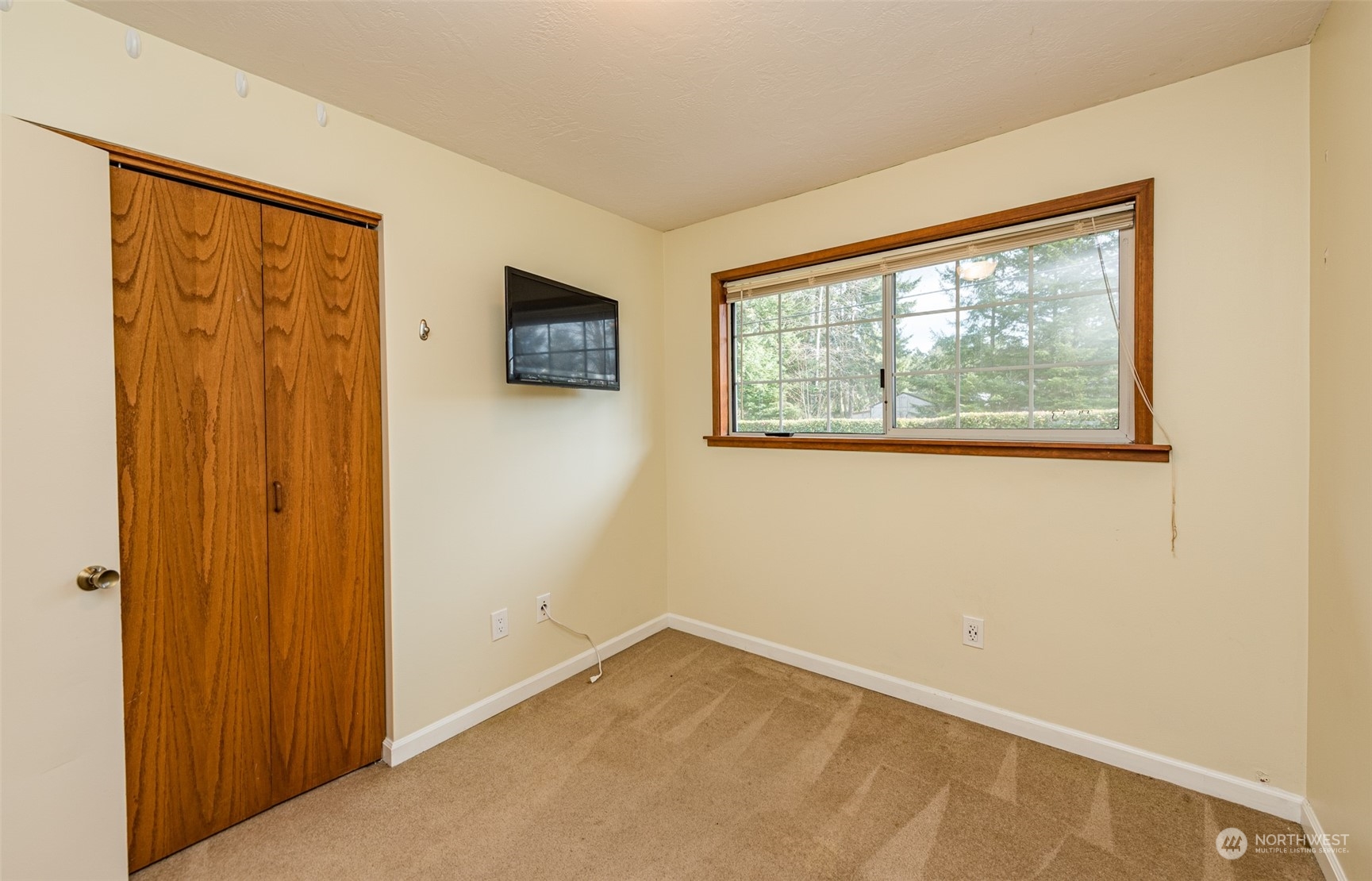 970 River Road Sequim, WA 98382 - Photo 11 of 40 a view of an empty room with a window