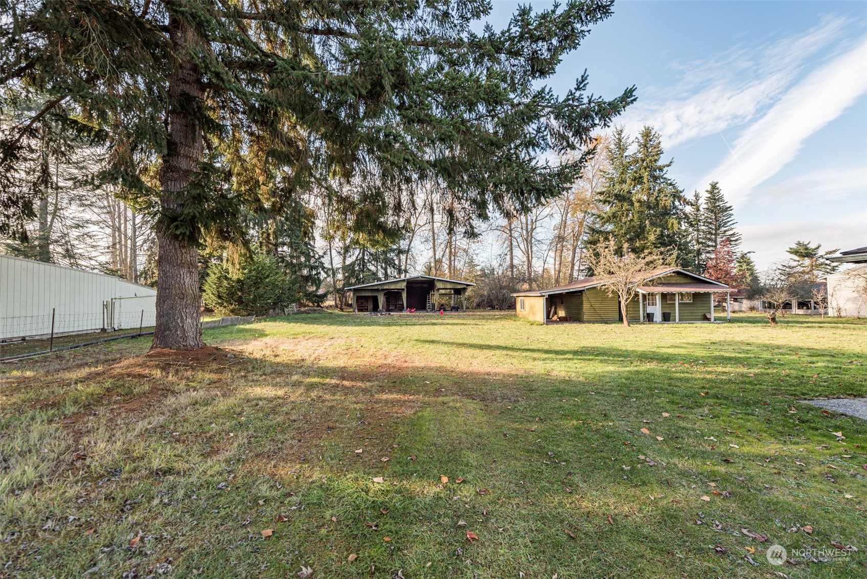 970 River Road Sequim, WA 98382 - Photo 19 of 40 a view of a house with a yard