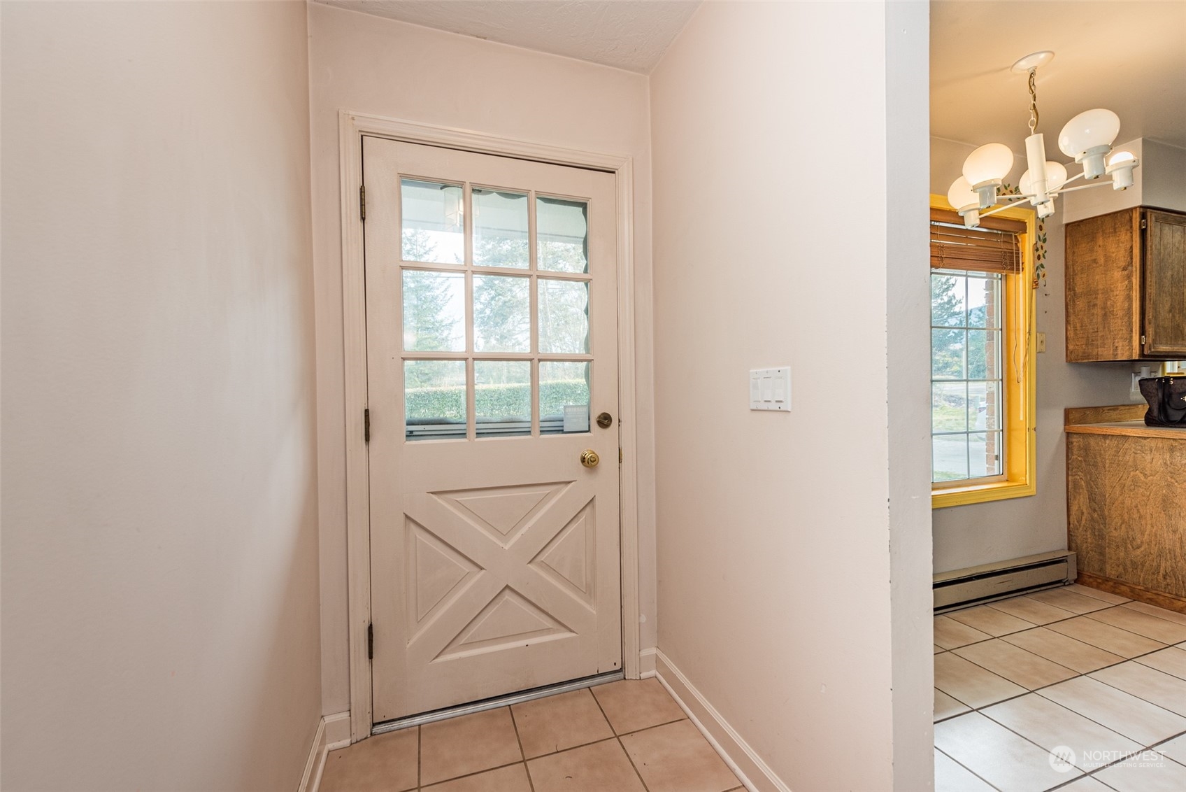 970 River Road Sequim, WA 98382 - Photo 2 of 40 a view of a livingroom with wooden floor and a window