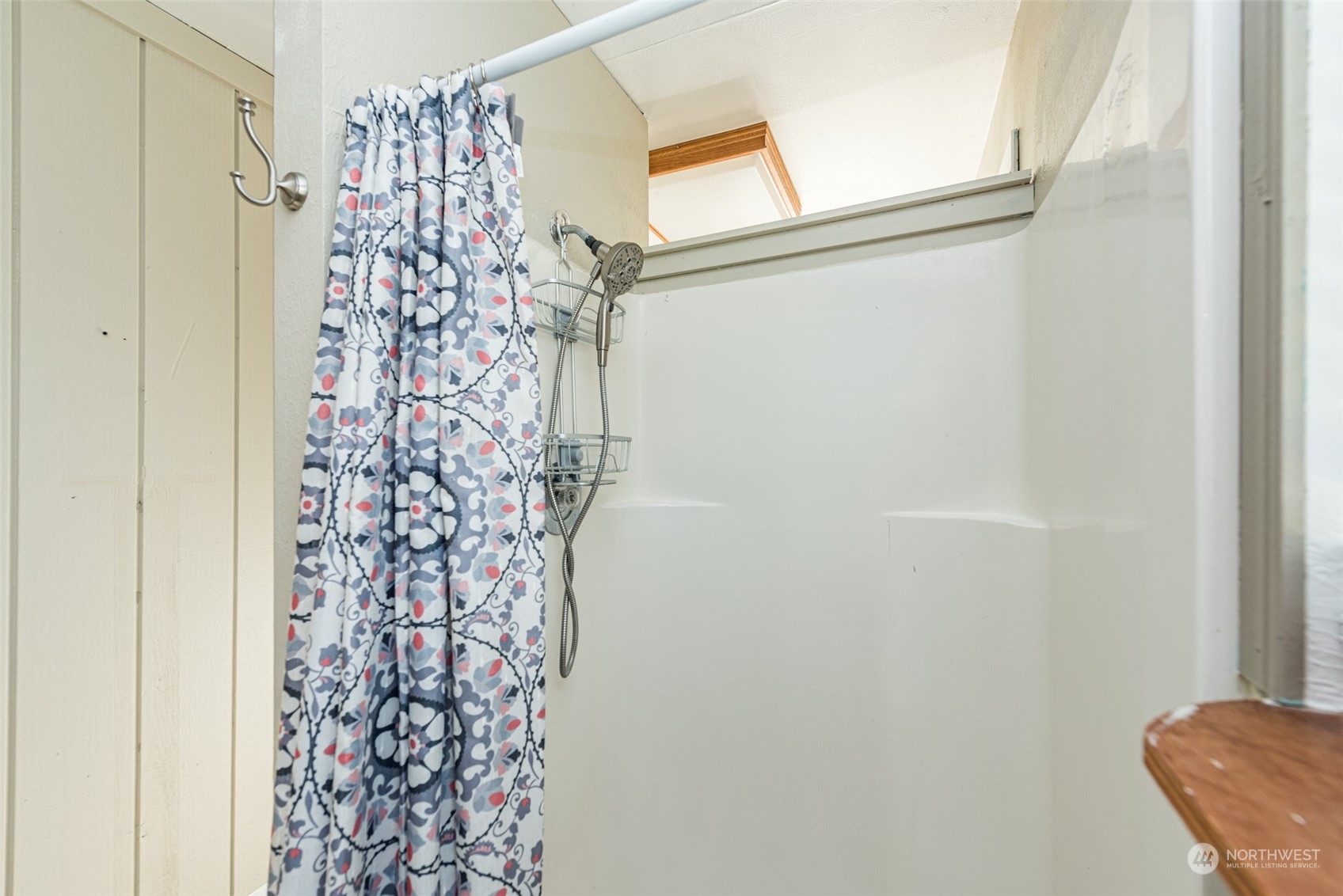 970 River Road Sequim, WA 98382 - Photo 25 of 40 a bathroom with a shower curtain and a curtain