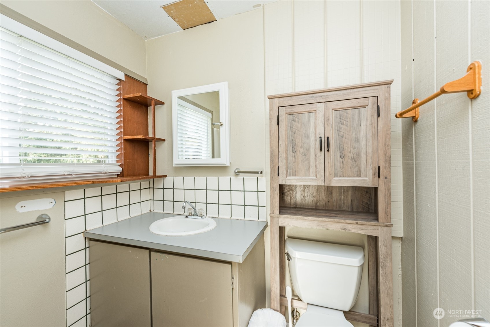 970 River Road Sequim, WA 98382 - Photo 26 of 40 a bathroom with a sink toilet and shower