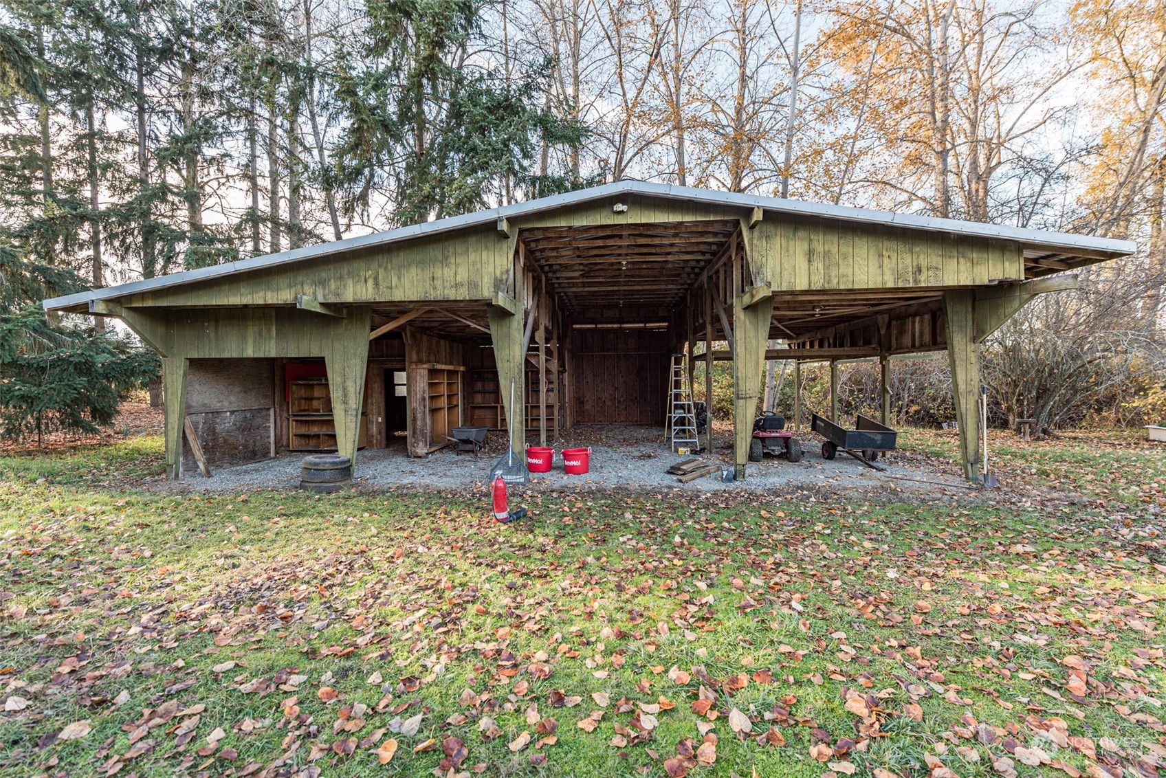 970 River Road Sequim, WA 98382 - Photo 28 of 40 a view of a house with yard and sitting area