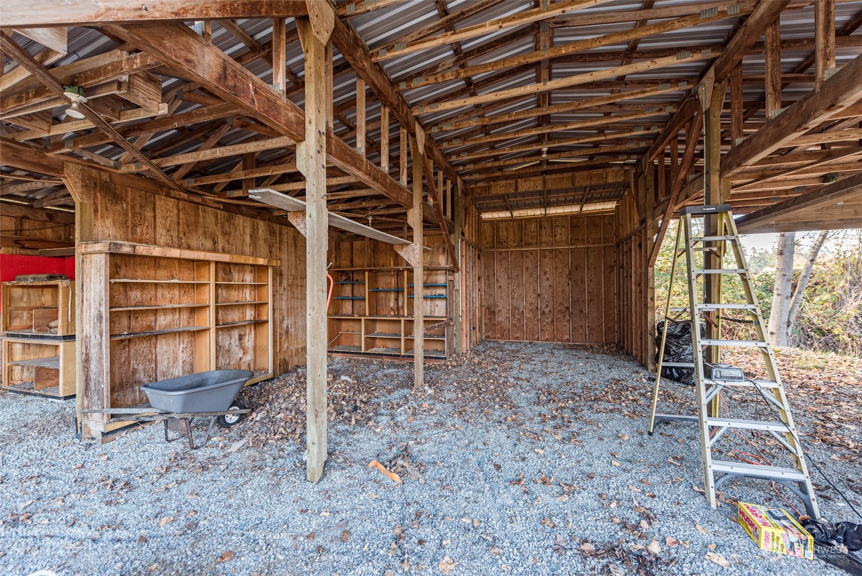 970 River Road Sequim, WA 98382 - Photo 29 of 40 a view of an empty room with wooden walls
