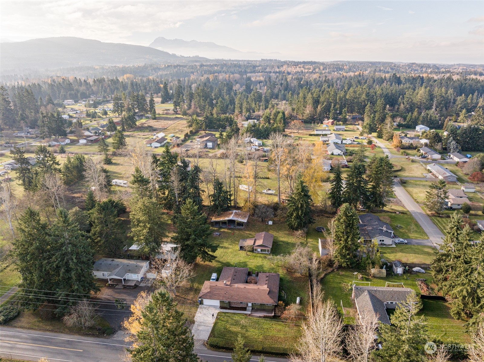 970 River Road Sequim, WA 98382 - Photo 33 of 40 an aerial view of residential house and covered with trees