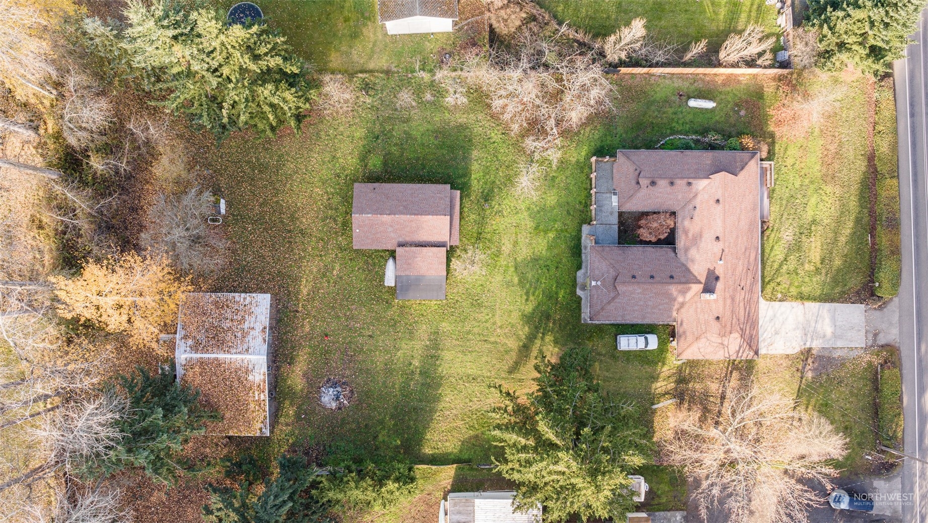 970 River Road Sequim, WA 98382 - Photo 34 of 40 an aerial view of residential houses with outdoor space