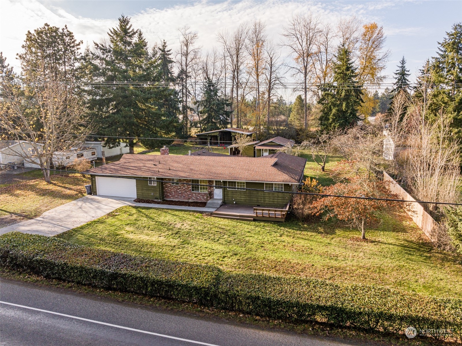 970 River Road Sequim, WA 98382 - Photo 37 of 40 a view of a swimming pool with an outdoor space
