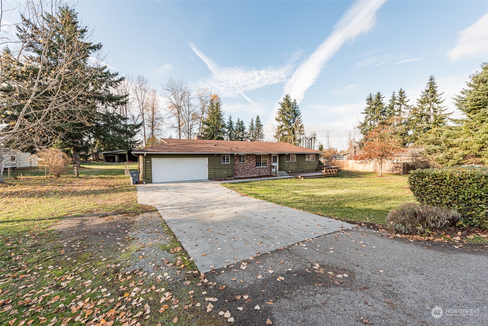 970 River Road Sequim, WA 98382 - Photo 39 of 40 a view of yard with swimming pool and trees in the background