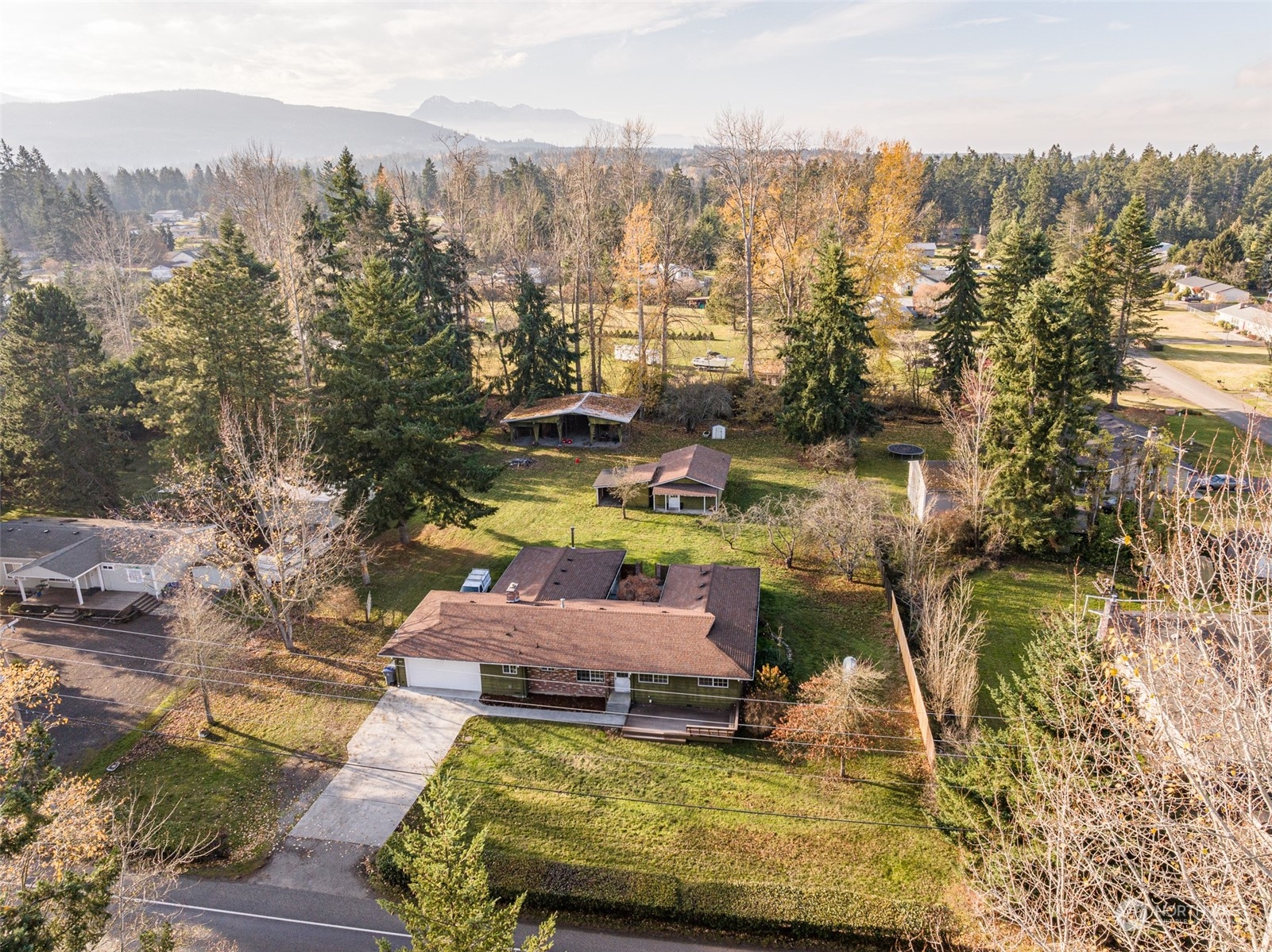 970 River Road Sequim, WA 98382 - Photo 40 of 40 a view of a swimming pool with a patio