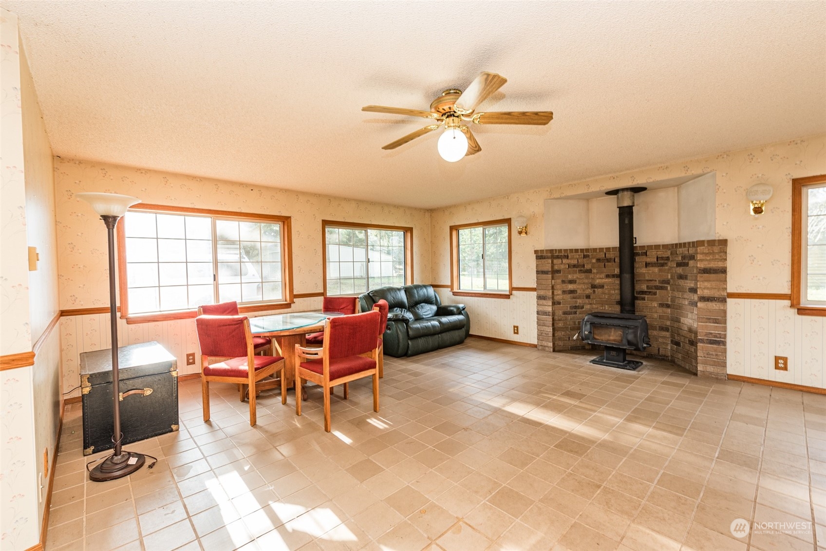 970 River Road Sequim, WA 98382 - Photo 7 of 40 a living room with furniture and a fireplace