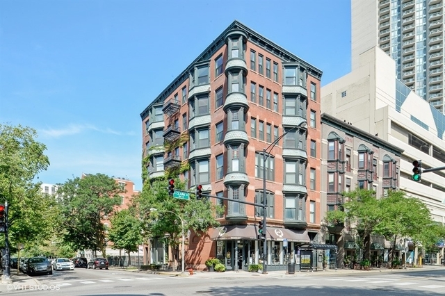 104 West Oak Street, Unit 2W Chicago, IL 60610 - Photo 1 of 17 a front view of a building