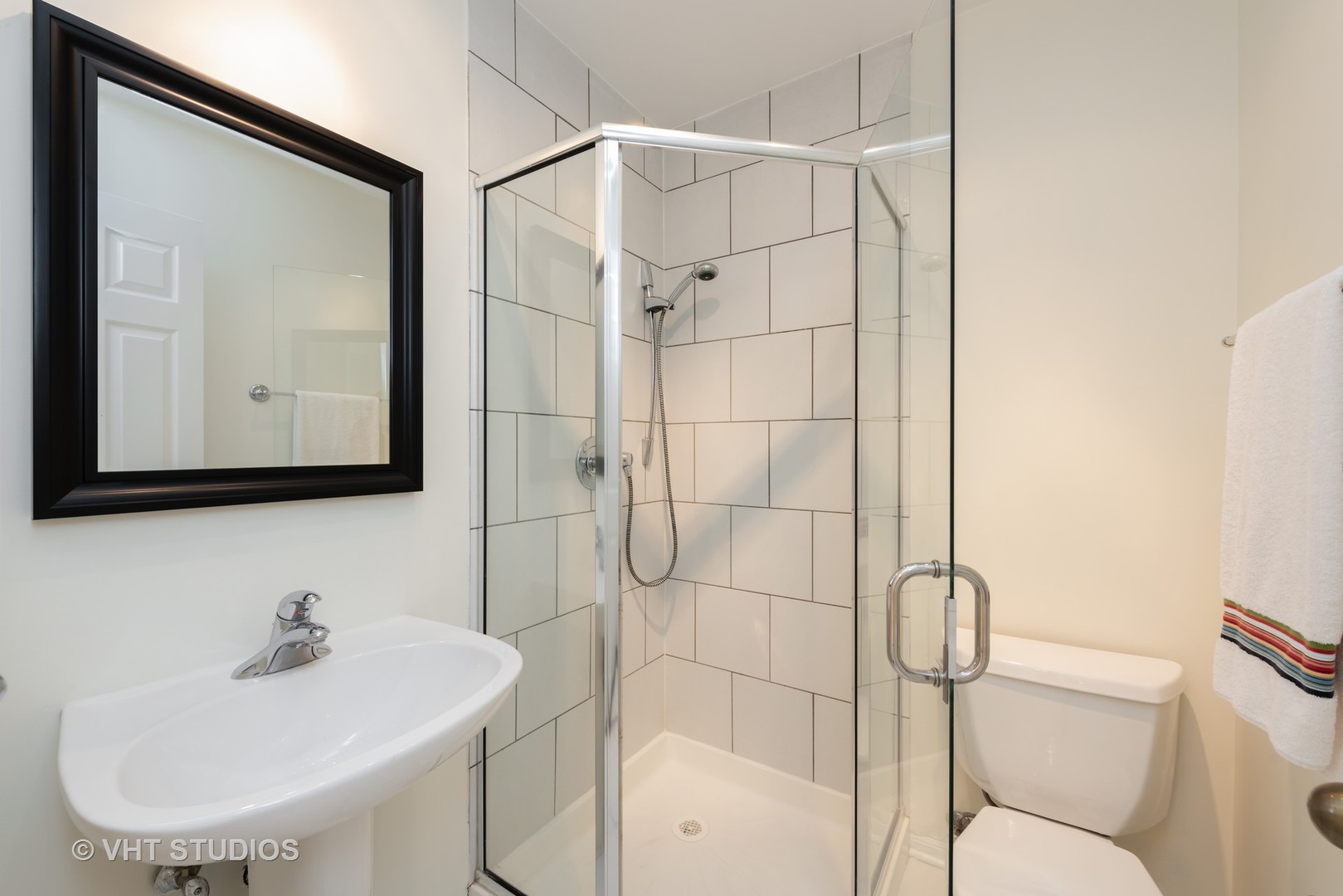 104 West Oak Street, Unit 2W Chicago, IL 60610 - Photo 16 of 17 a bathroom with a sink toilet and shower