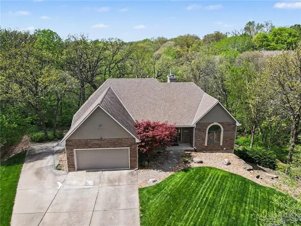 $575,000 | 2401 Southwest Whispering Creek Court, Blue Springs, MO 64015