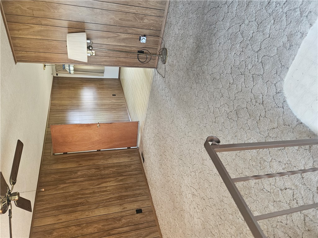6510 Longford Road Dayton, OH 45424 - Photo 11 of 27 This interior offers a blend of classic wood paneling and comfortable carpeting.