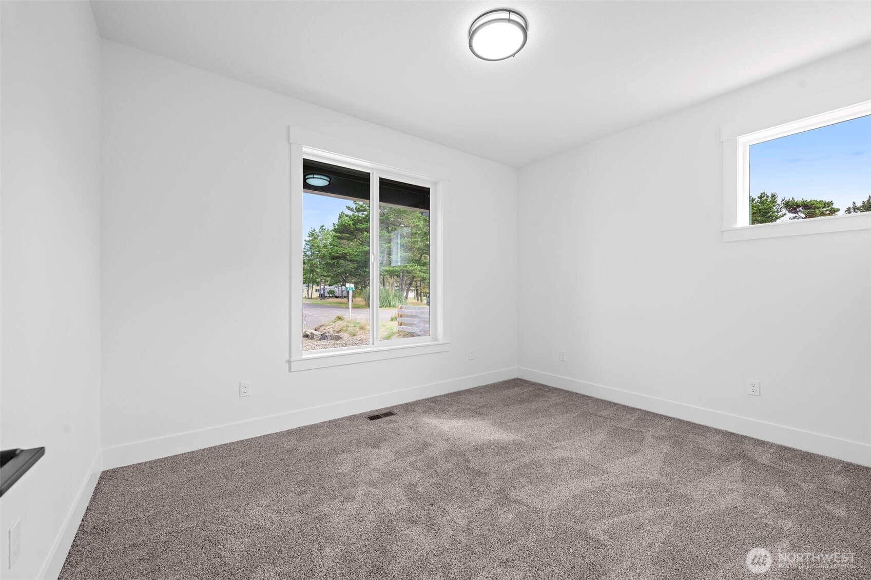 1306 195th Street Long Beach, WA 98631 - Photo 16 of 24 an empty room with windows