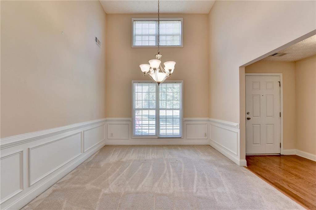 52 Katie Spring Lane Jefferson, GA 30549 - Photo 12 of 57 a view of an empty room with a window