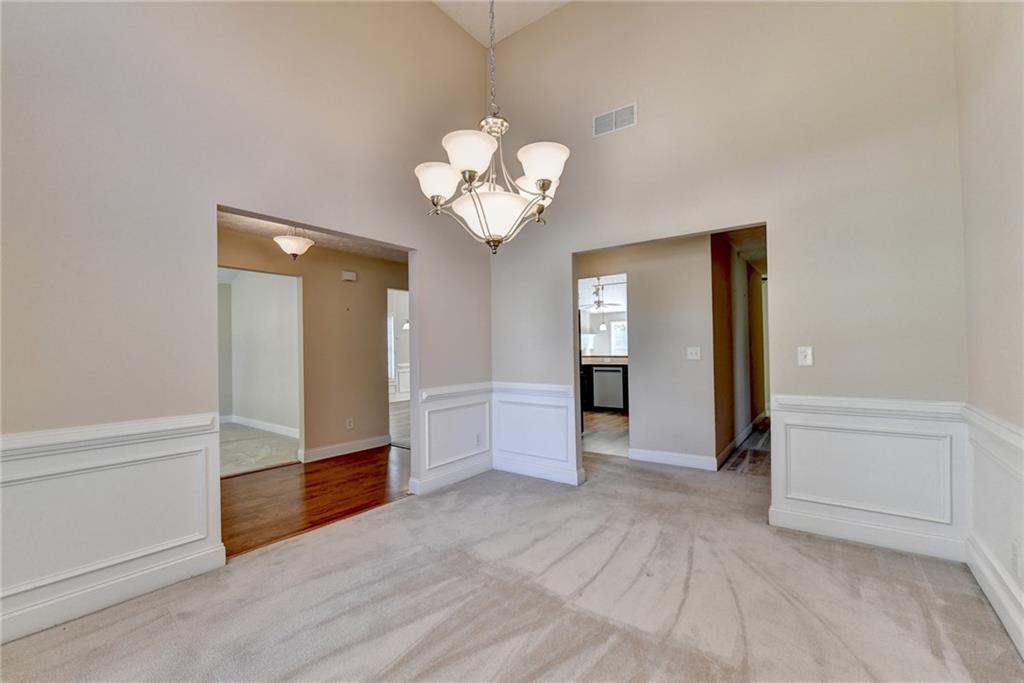 52 Katie Spring Lane Jefferson, GA 30549 - Photo 14 of 57 a view of an empty room with a window