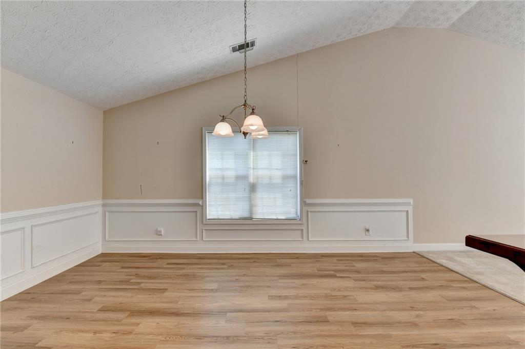 52 Katie Spring Lane Jefferson, GA 30549 - Photo 20 of 57 a view of an empty room with a window