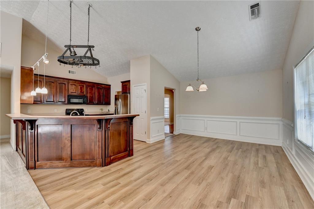 52 Katie Spring Lane Jefferson, GA 30549 - Photo 22 of 57 a view of a kitchen with electric appliances