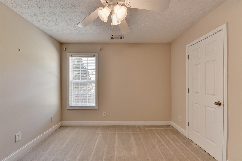 52 Katie Spring Lane Jefferson, GA 30549 - Photo 44 of 57 wooden floor in an empty room with a window