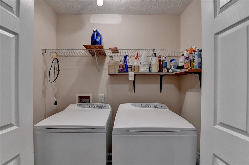 52 Katie Spring Lane Jefferson, GA 30549 - Photo 47 of 57 a utility room with dryer and washer
