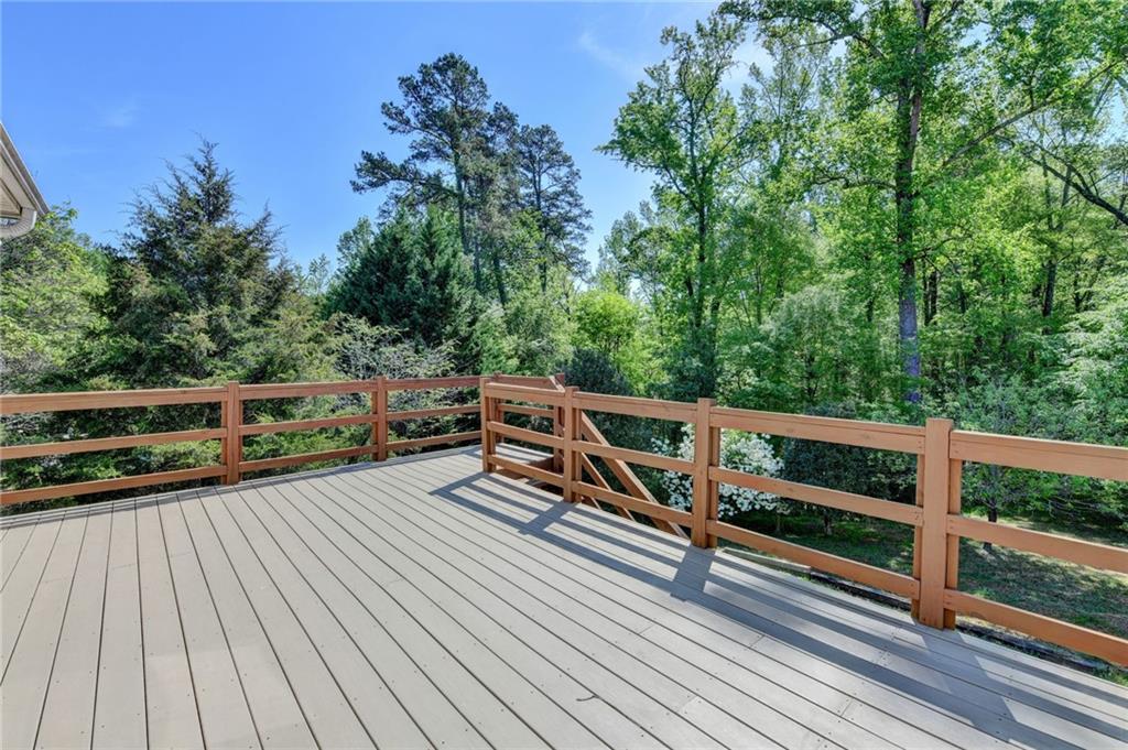 52 Katie Spring Lane Jefferson, GA 30549 - Photo 50 of 57 a view of balcony with wooden floor and fence