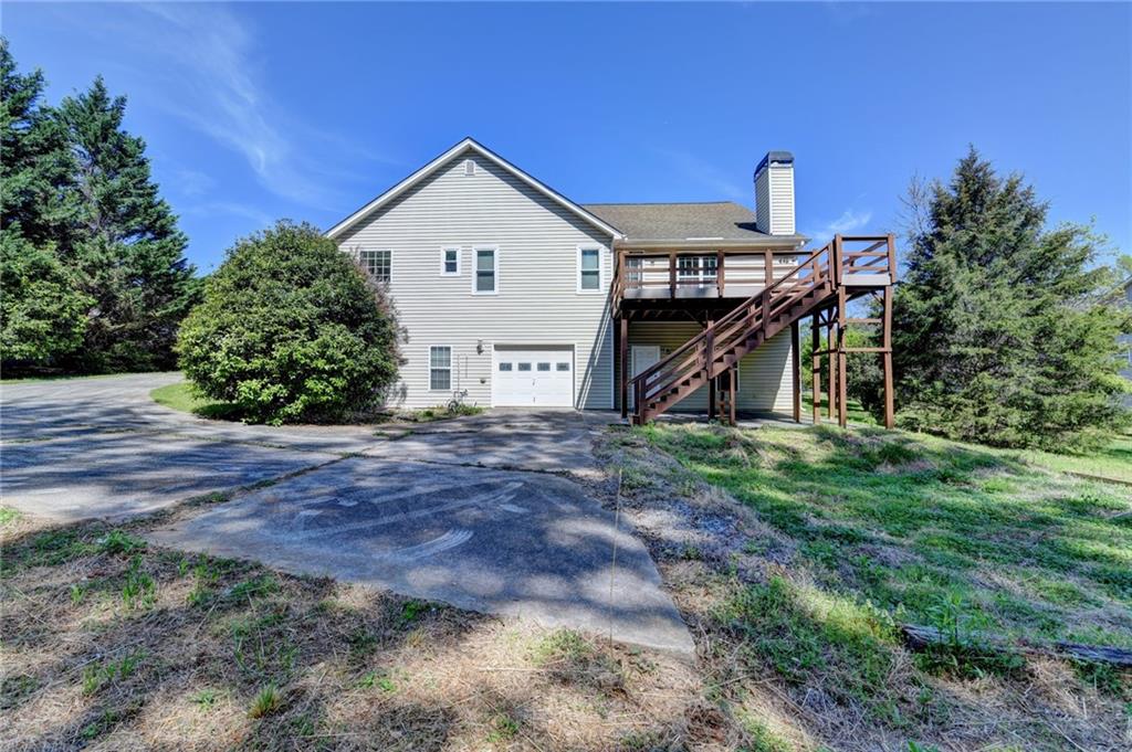 52 Katie Spring Lane Jefferson, GA 30549 - Photo 55 of 57 a view of a house with a yard