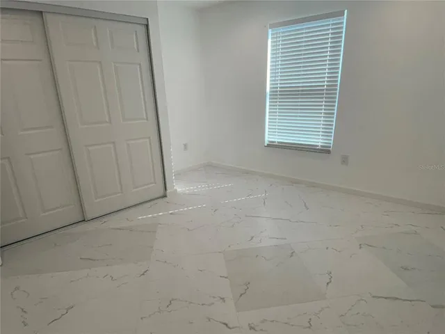 an empty room with closet