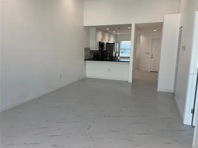 a view of a kitchen with a sink