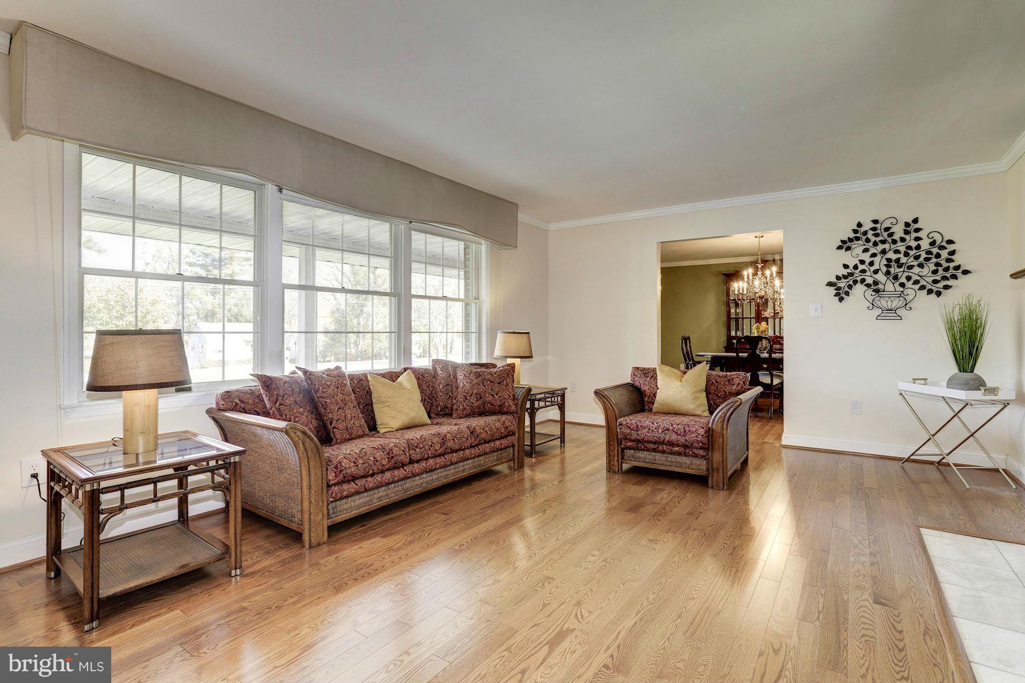 10003 Old Frederick Road Ellicott City, MD 21042 - Photo 3 of 30 GLEAMING HARDWOODS IN LIVING ROOM