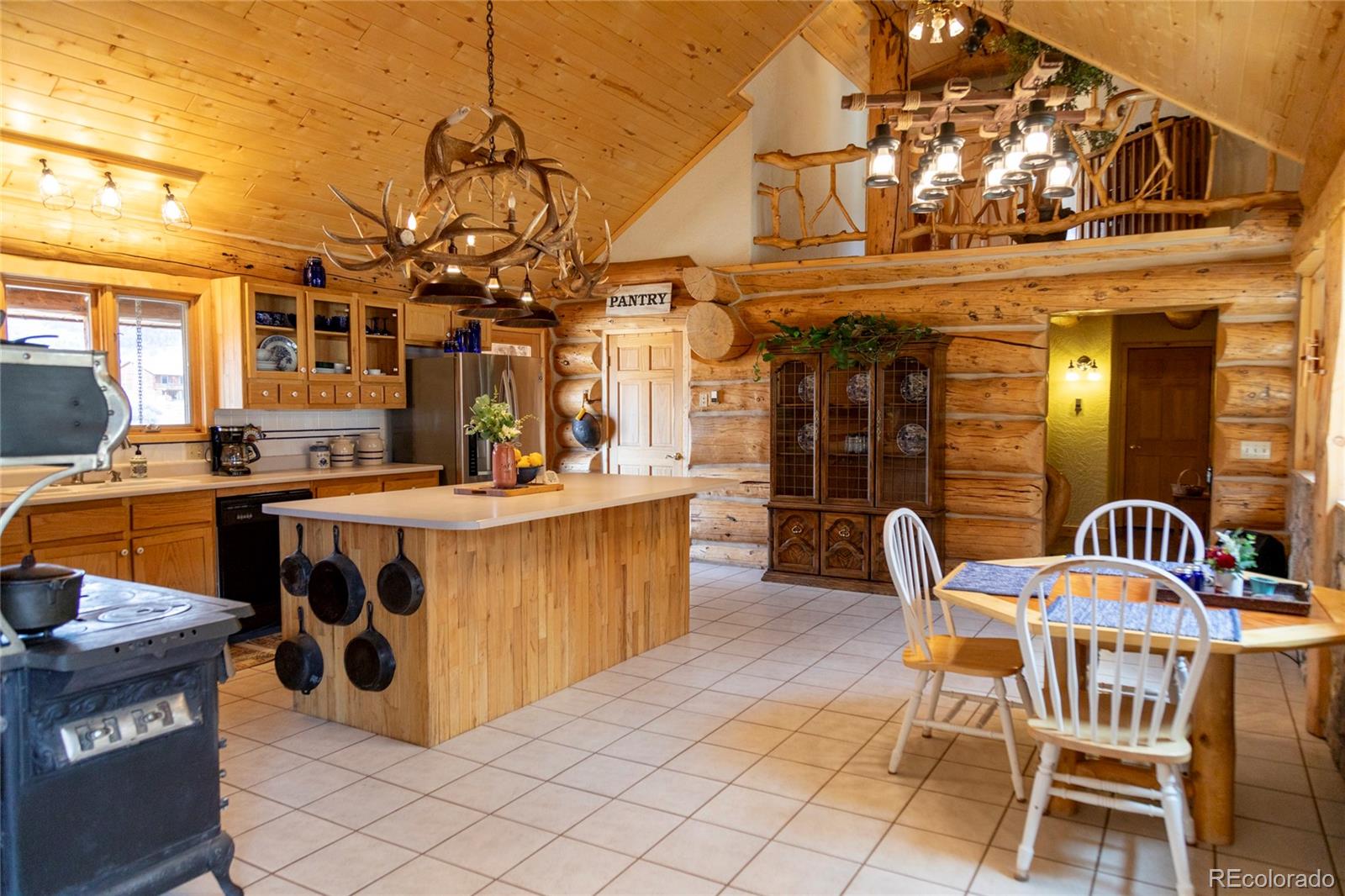 108 Forest Road, Unit 552 Creede, CO 81130 - Photo 14 of 32 a view of a chairs and tables in patio