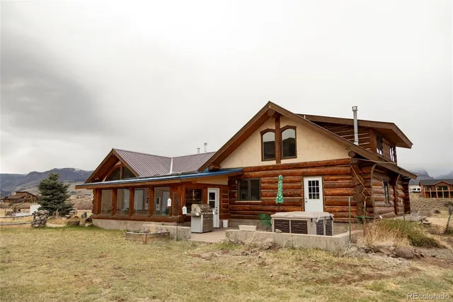 a house that has tree in front of it