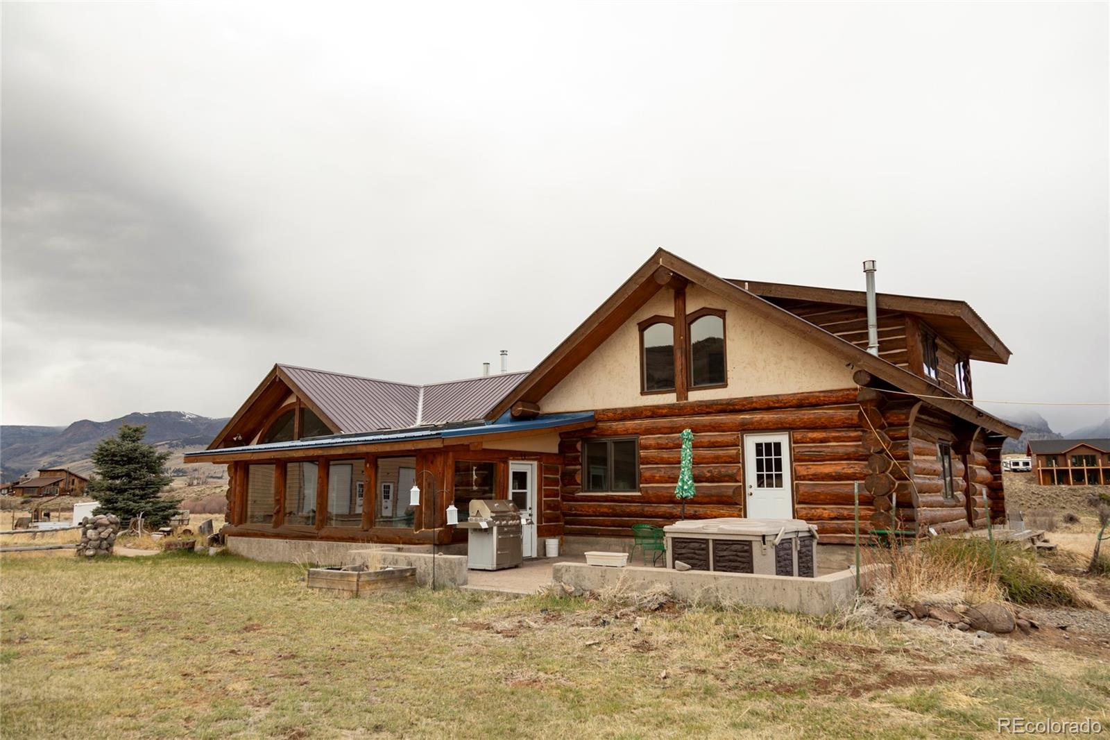 108 Forest Road, Unit 552 Creede, CO 81130 - Photo 15 of 32 a house that has tree in front of it