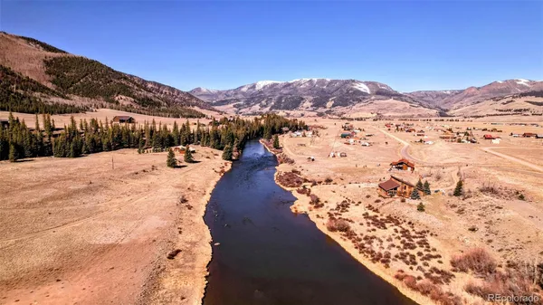 a view of a lake with a mountain