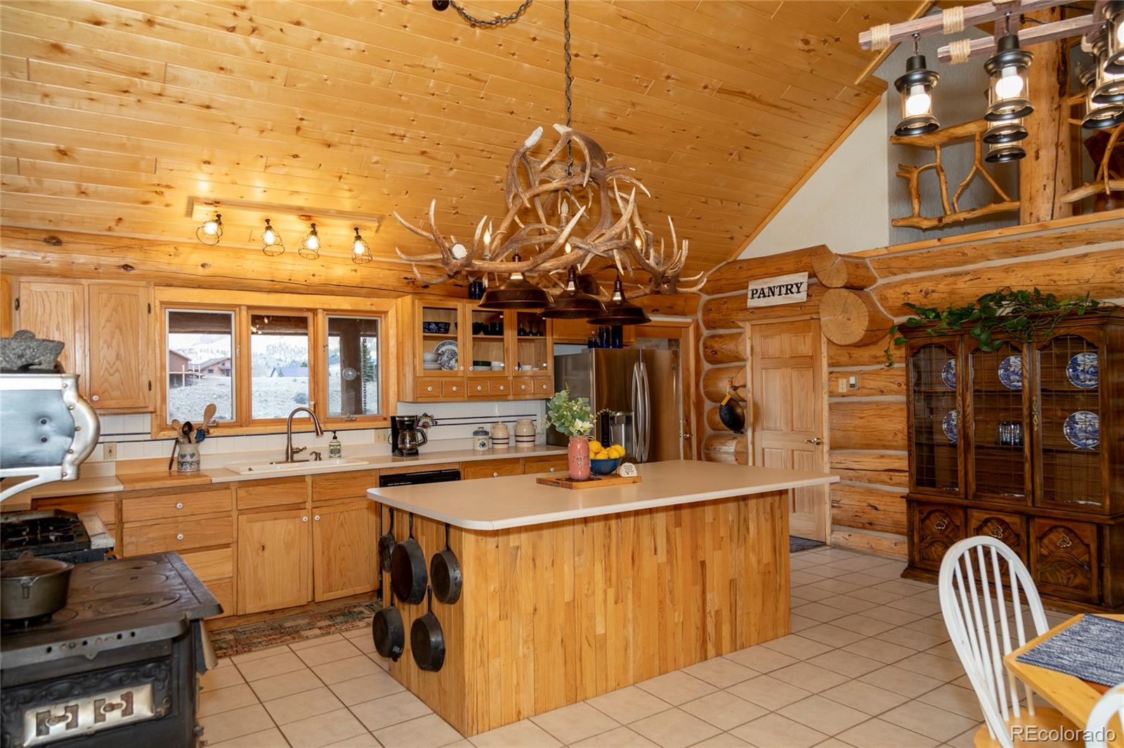 108 Forest Road, Unit 552 Creede, CO 81130 - Photo 3 of 32 a kitchen filled a counter top space a sink and appliances
