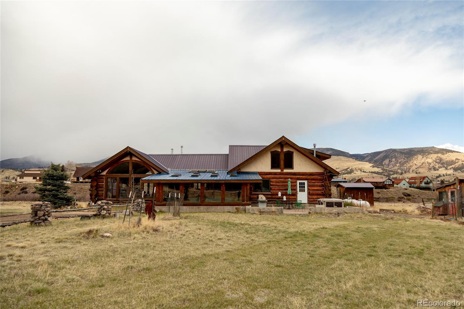 108 Forest Road, Unit 552 Creede, CO 81130 - Photo 7 of 32 a front view of a house with a yard