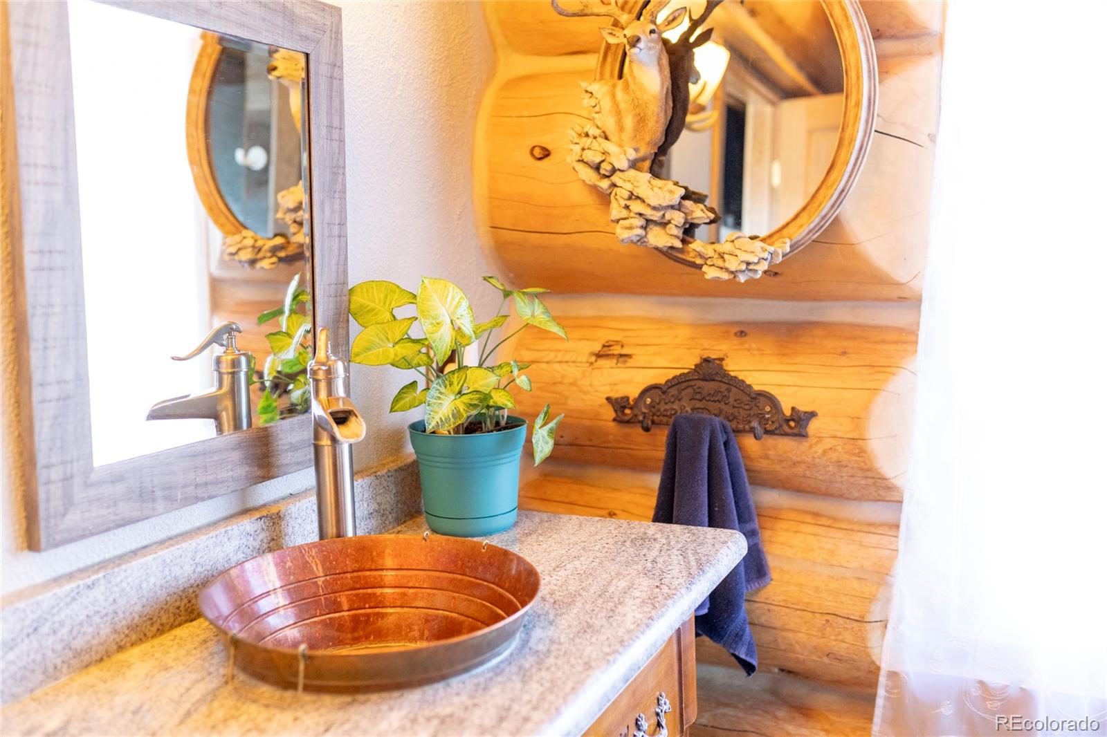 108 Forest Road, Unit 552 Creede, CO 81130 - Photo 8 of 32 a view of a dining room with a table and chairs