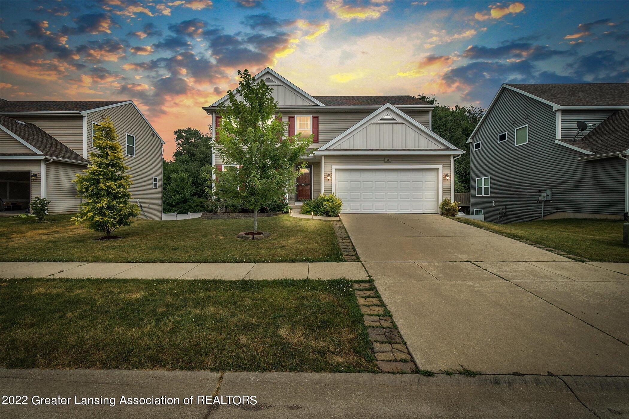 59 Lake Ridge Drive Mason, MI 48854 - Photo 1 of 51 Front
