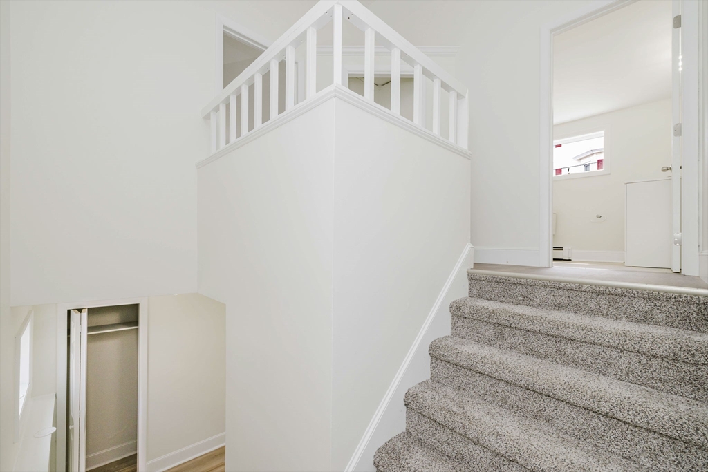 194 Albion Street Fall River, MA 02723 - Photo 11 of 42 a view of staircase with white walls