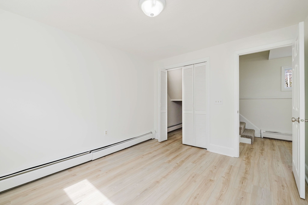 194 Albion Street Fall River, MA 02723 - Photo 13 of 42 a view of empty room with wooden floor