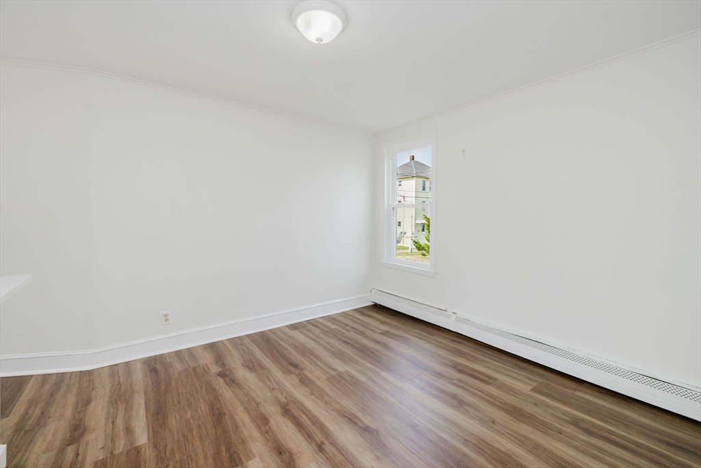 194 Albion Street Fall River, MA 02723 - Photo 19 of 42 a view of an empty room and window