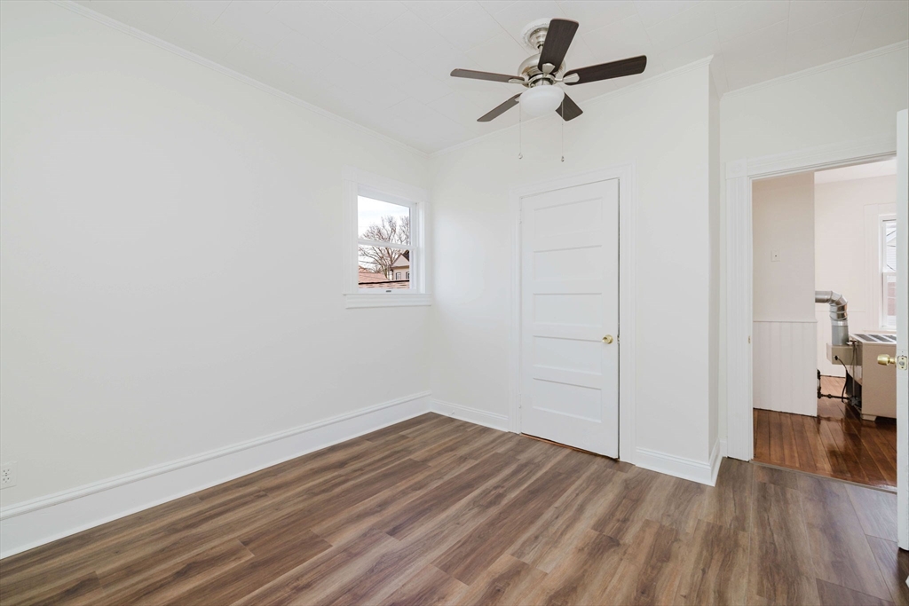 194 Albion Street Fall River, MA 02723 - Photo 28 of 42 wooden floor in an empty room