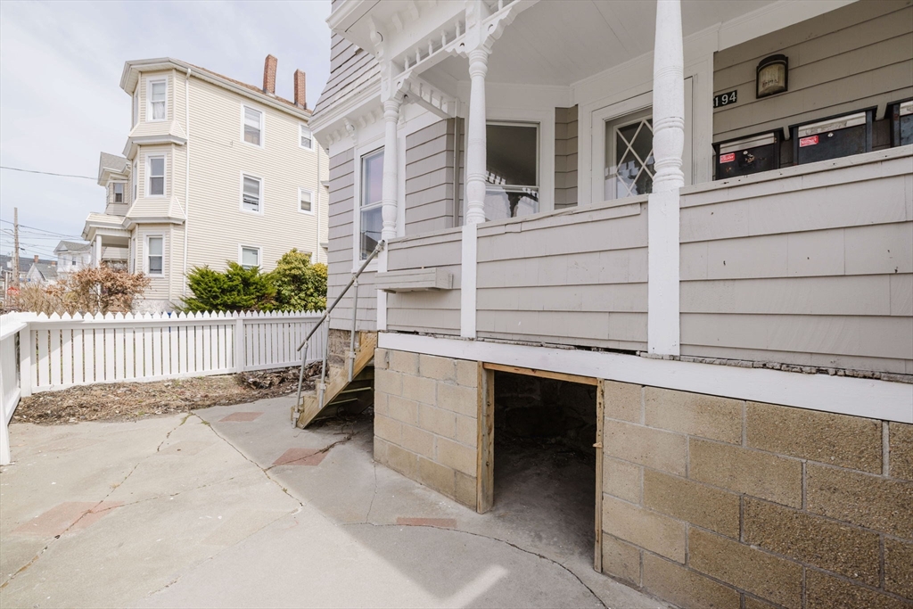 194 Albion Street Fall River, MA 02723 - Photo 5 of 42 a view of a balcony with chairs