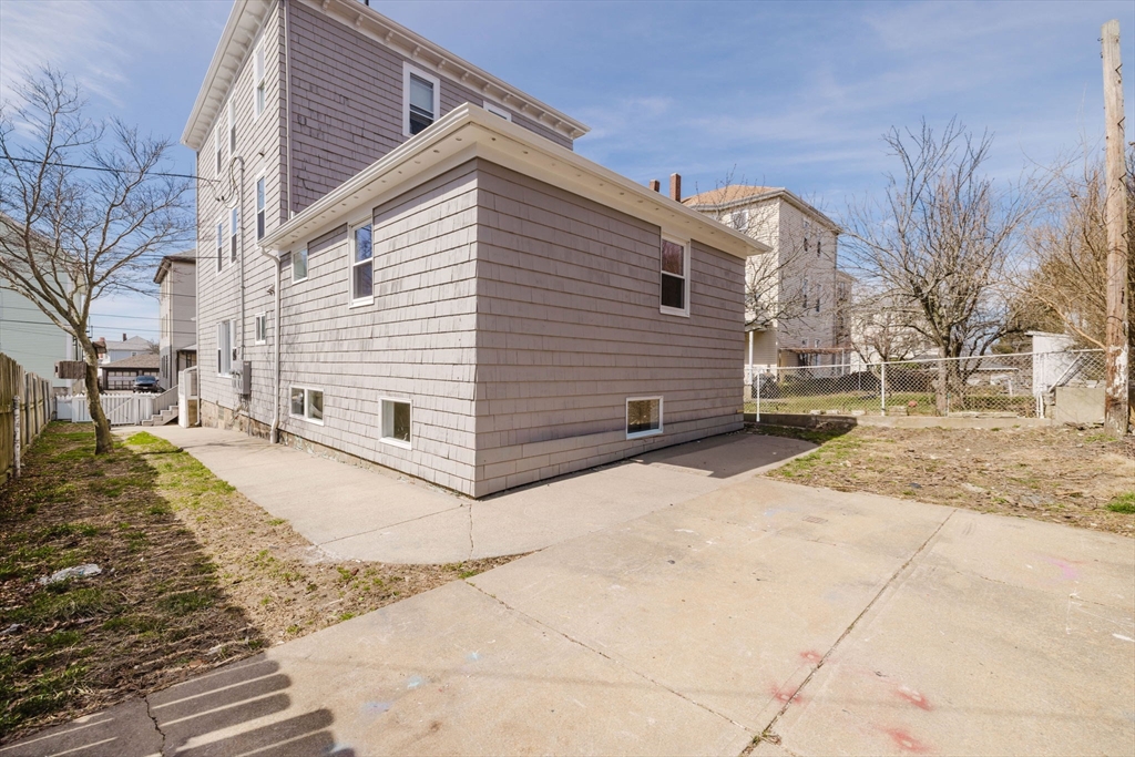194 Albion Street Fall River, MA 02723 - Photo 6 of 42 a view of a house with a yard