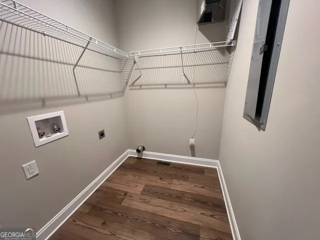 a view of a room with rack on the wall