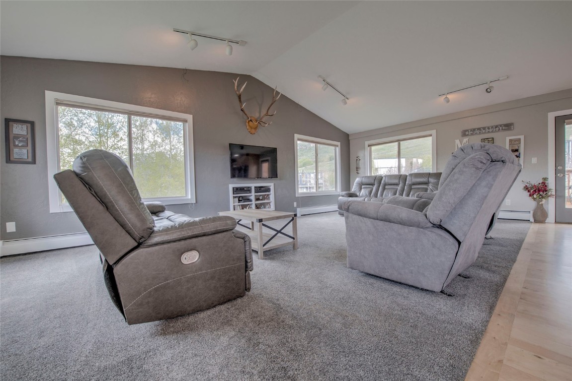 231 Alpine Road Dillon, CO 80435 - Photo 2 of 40 a living room with furniture and a large window